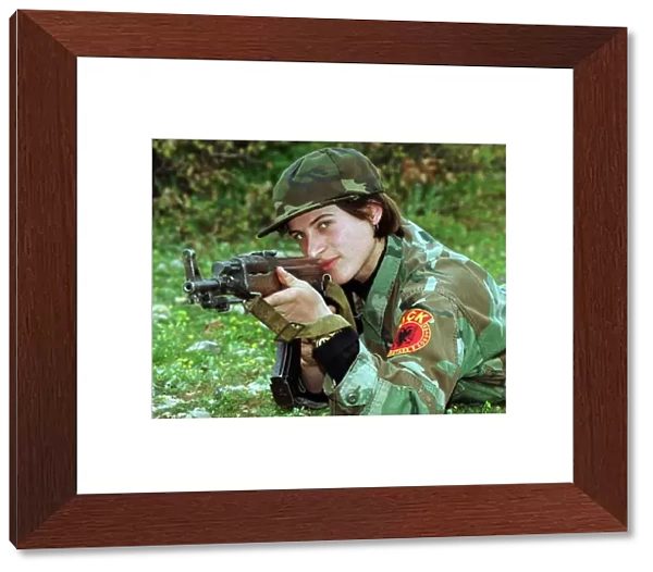 Luljeta Gashi of the Kosovo Liberation Army KLA April 1999 Soldier taking aim with