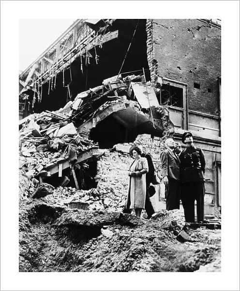 Queen Elizabeth and King George VI tour bomb sites during the Blitz of London