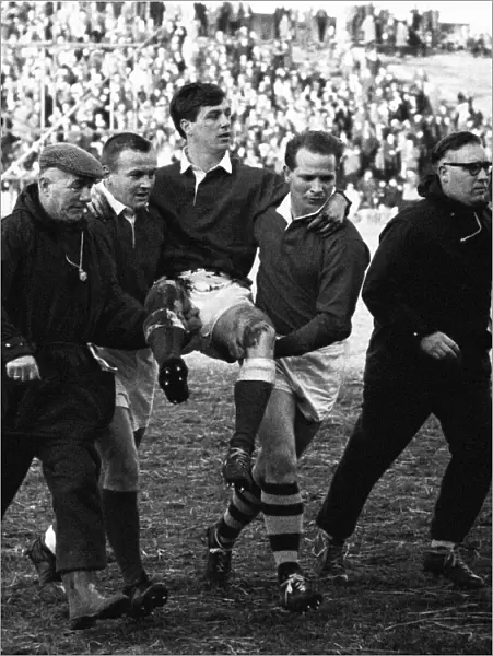 Wales Probables v Possibles, Swansea Jan 1967. Probables fly half Barry John is carried