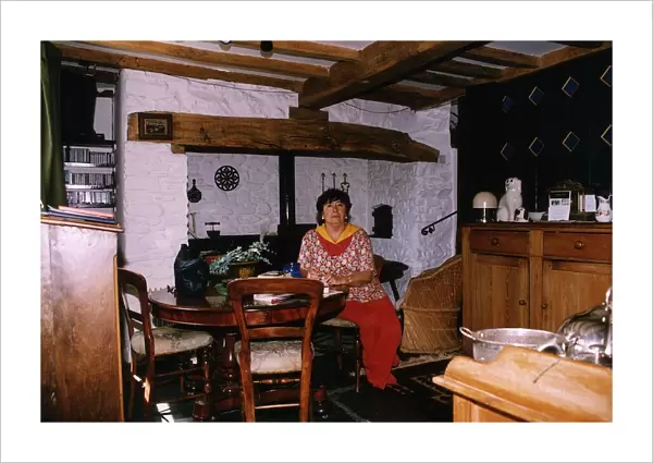 Mavis Nicholson TV Presenter sitting in her Dining Room Area