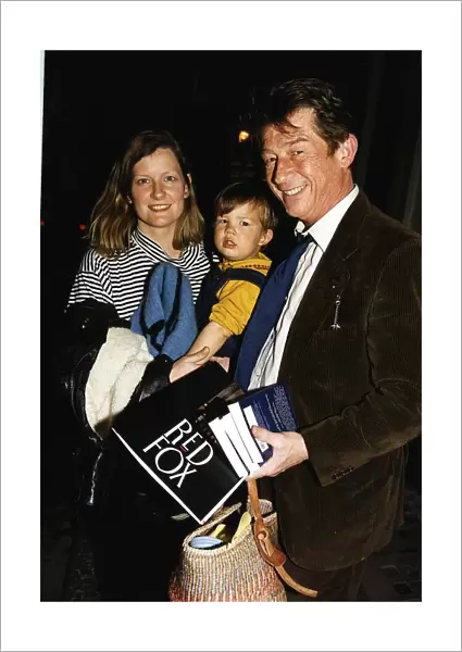 John Hurt Actor with wife Jo Dalton and son leaving the Ivy restaurant after the launch