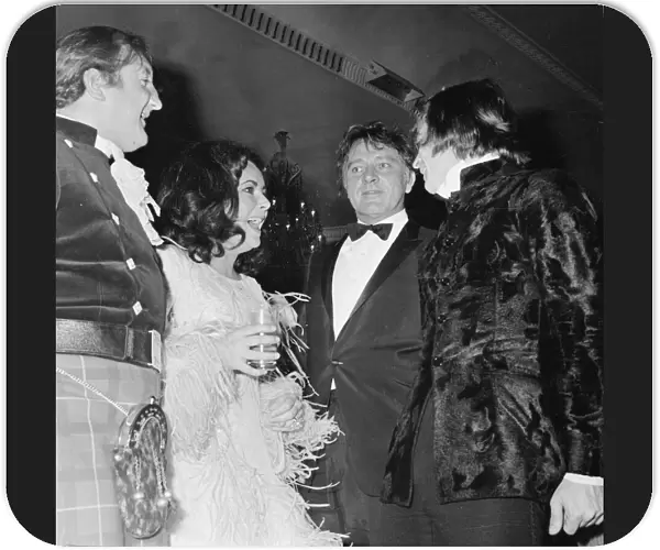 Elizabeth Taylor joking with Nureyev and Richard Burton March 1968