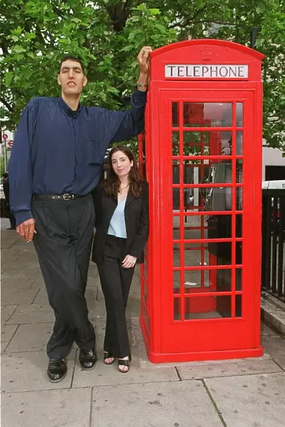 Worlds tallest man Radhouane Charib in London May 1999 at 7ft 9inches with Mirror