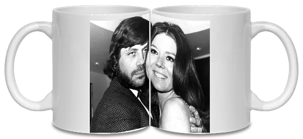 Actress Diana Rigg with Oliver Reed with whom she stars in the film The Assasination