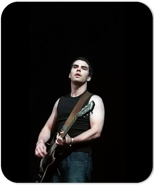 Kelly Jones of the Stereophonics plying the guitar on stage at T in the Park June 1999