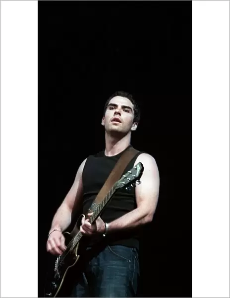Kelly Jones of the Stereophonics plying the guitar on stage at T in the Park June 1999