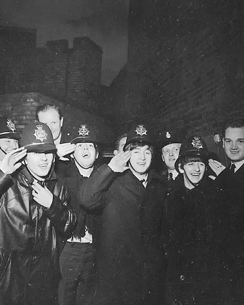 The Beatles clown dressed in policemen helmets used to smuggle them into the Birmingham