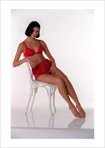 Model wearing Red Uplift Bra from La Senza and Red Satin Knickers from a selection by