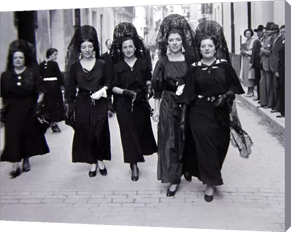 Four ladies of Seville, Spain wearing black dresses Circa 1935