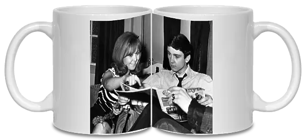 Singing stars Lulu and Gene Pitney relax during an interval between shows at the Capitol