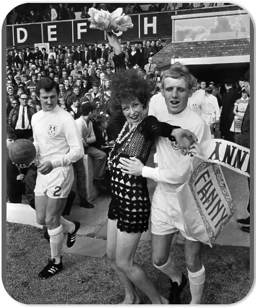 Millwalls Eamonn Dunphy (with inside forward) hugs Melina Martin as the Millwall