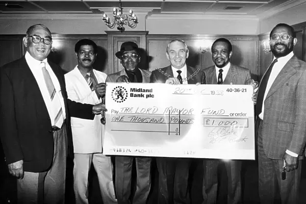 Cheque Presentation by Members of the West Indian Community Association, 1