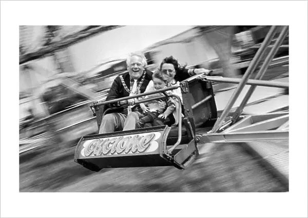 The Lord Mayor of Coventry Councillor Jeff White gets in a spin with three year old