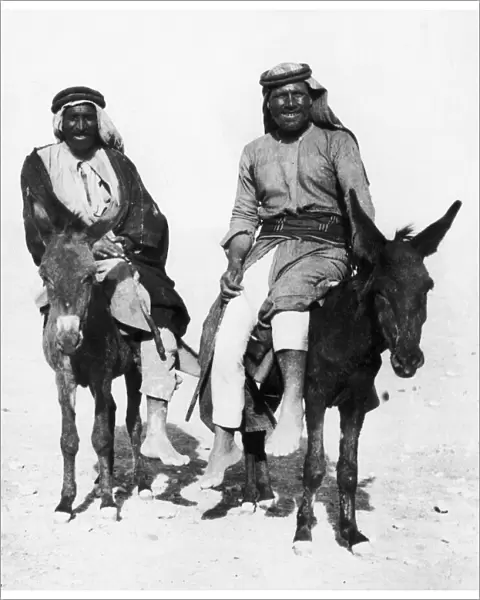 Two Arabs seen here on donkeys return to Beersheba following the towns occupation by