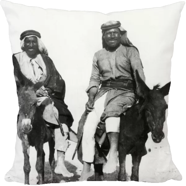Two Arabs seen here on donkeys return to Beersheba following the towns occupation by