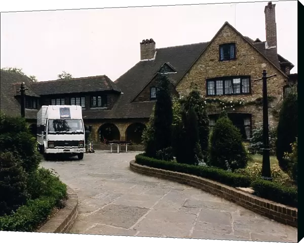 Home of Five Star Pop Group with removal van parked in front of it Five Star
