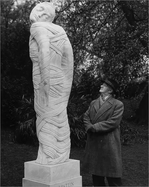 Sculptor Jacob Epstein seen here with one of his works. Circa December 1953