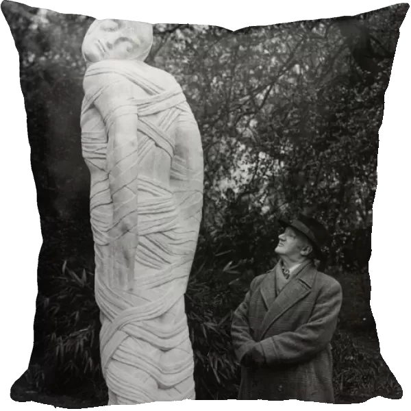 Sculptor Jacob Epstein seen here with one of his works. Circa December 1953