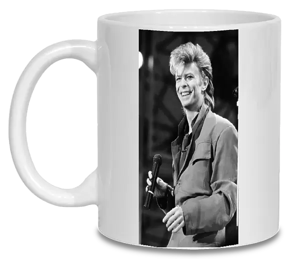 British pop singer David Bowie pictured performing in concert at Wembley