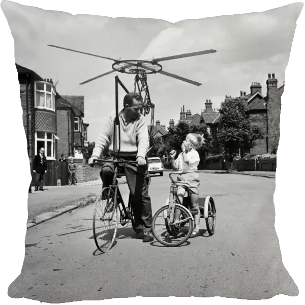 Mr Clifford Davis of Leeds Road Wakefield, tries out his flying machine made from bits of