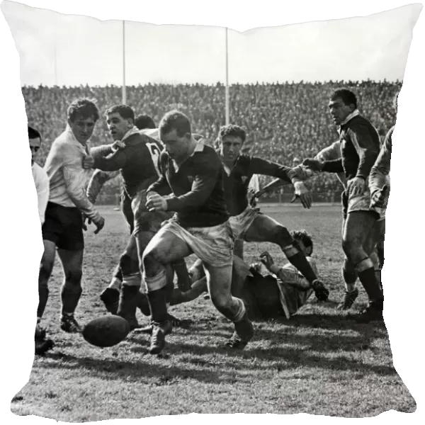 Wales v France rugby match. Welsh forward John Lloyd dribbling the ball in the loose