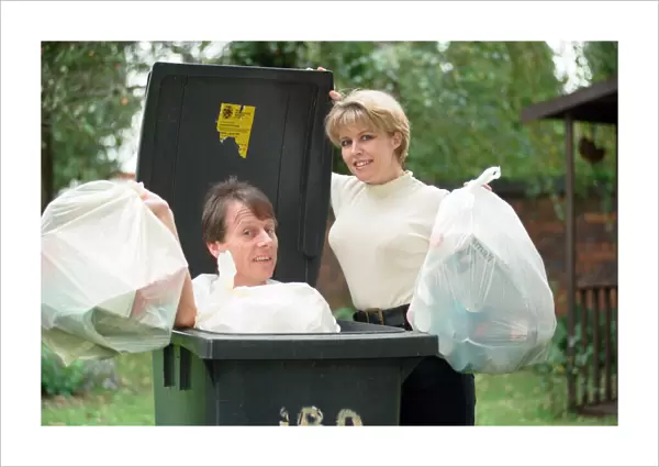 Radio presenters Tony Wadsworth and Julie Mayer are pictured with some rubbish