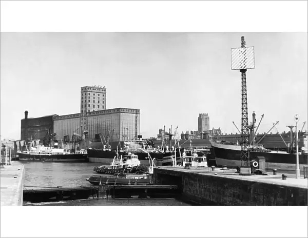 An impressive view from the entrance to Brunswick Dock in Liverpool with the towers of