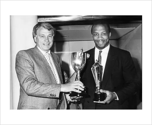 Bobby Robson (left) Cyrille Regis (right) at The Midland society Writers annual dinner at