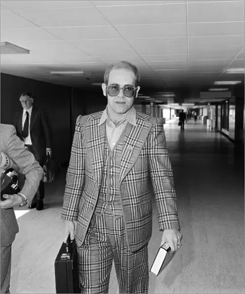 Elton John leaving Heathrow Airport for Helsinki where he will be for one day to watch