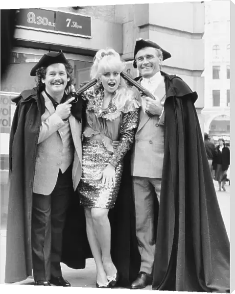 Cannon and Ball comedians Tommy Cannon and Bobby Ball with model Erica Preston DBase