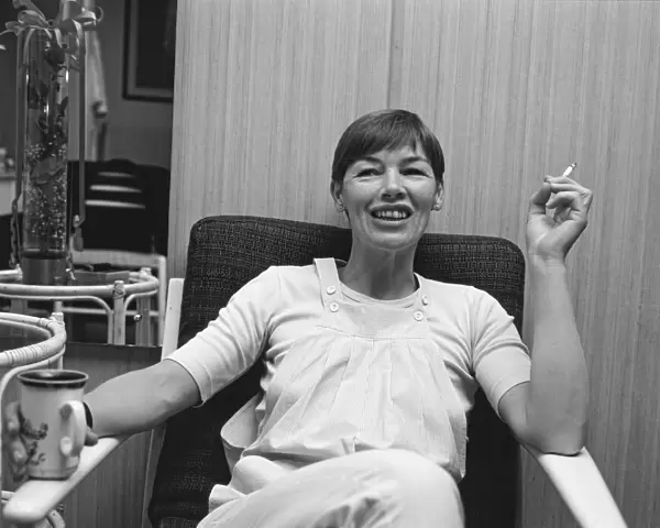 Glenda Jackson, actor, pictured enjoying a drink, a cigarette and a moment