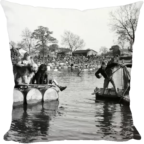 Boys on rafts and tin-bath boats. Circa 1946