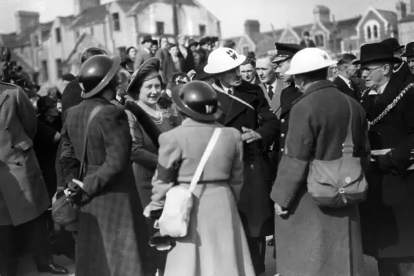 The Queen and King George VI visit Cardiff, Wales. March 1941