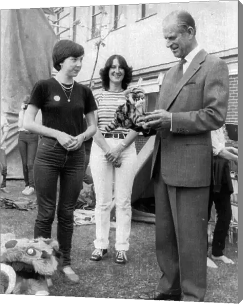 The Duke of Edinburgh. Patricia Woods is gives a toy Tiger Prince Philip