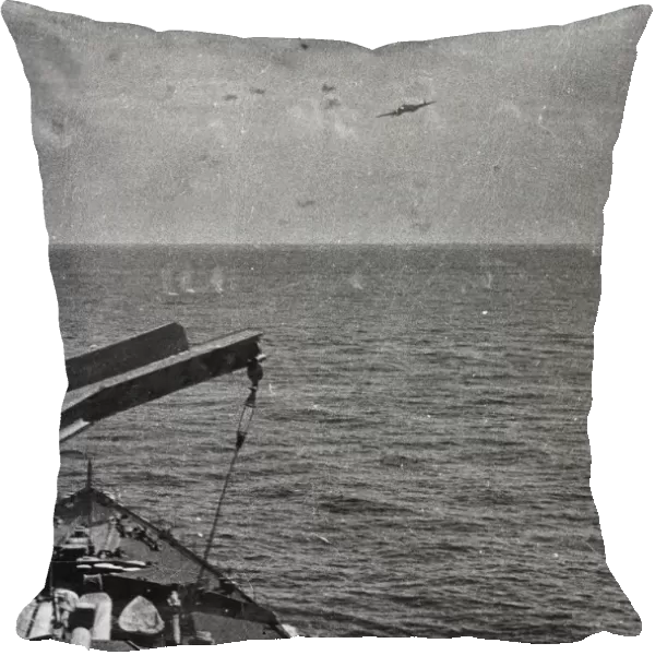 An aerial torpedo attack by an Italian Fiat BR 20 torpedo bomber on HMS Nelson