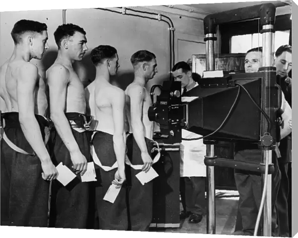 At an aircraft receiving depot, cadets are being x-rayed in modern manner