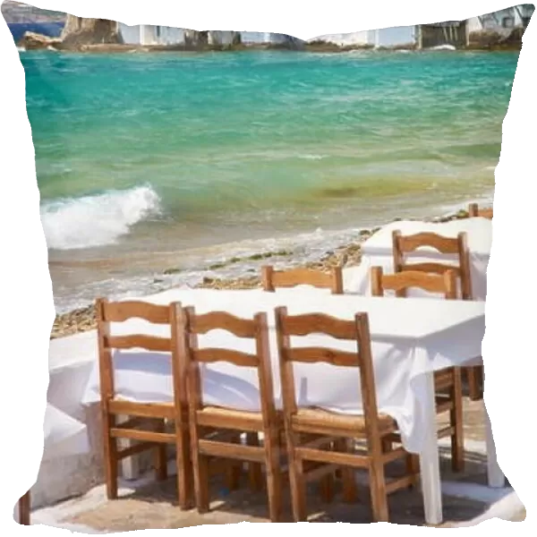 Cafe restaurant in Mykonos Town, Chora, Little Venice in the background - Mykonos Island, Cyclades, Greece