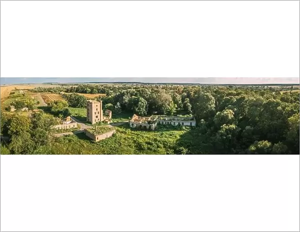 Aerial View Remains Of Yastrzhembsky Estate And Park Complex. Top View Of Old Five-storey Brick Water Tower. Drone View Of Beautiful European Nature