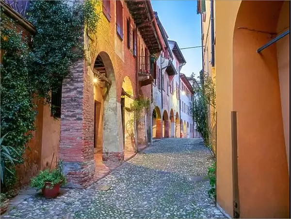Treviso, Italy. Cityscape image of colorful street located in old town Treviso, Italy at sunset