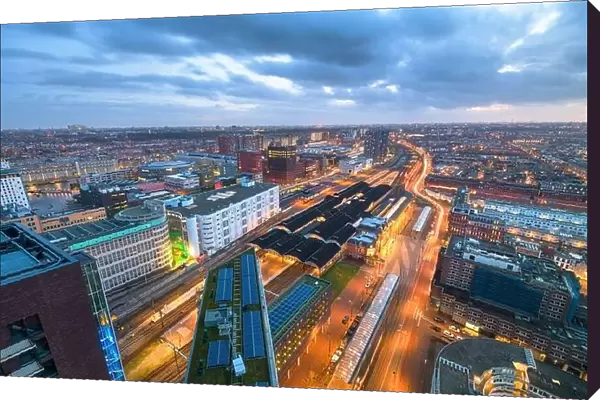 The Hague, Netherlands cityscape overlooking Den Haag HS railway station at twilight
