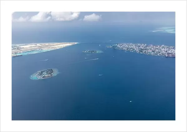 The capital of Maldives from the sky. Aerial view on male the capital city of maldives. overcrowded island in the indian ocean blue ocean sea