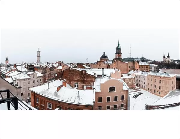 Lviv in winter time. Picturesque view on Lviv city center from top of old roof. Eastern Europe, Ukraine