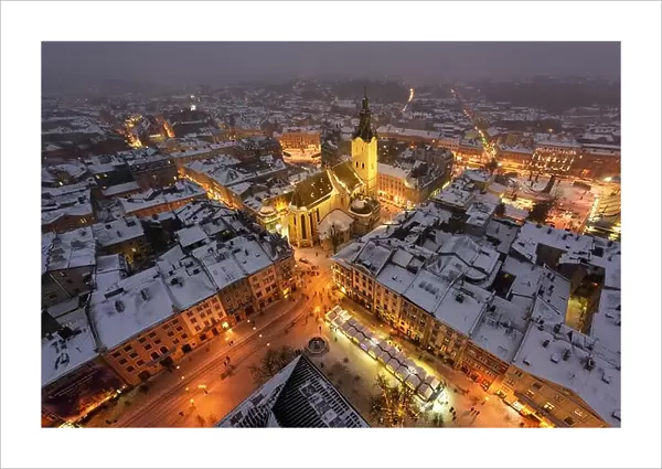 Lviv in winter time. Picturesque evening view on city center from top of town hall. Eastern Europe, Ukraine
