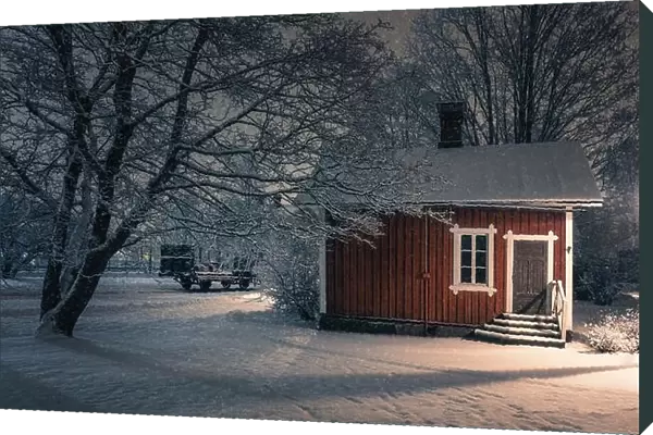Public cozy old cafe place with snow mood at winter evening in Finland. Light snowflakes. This place is open only in summer time