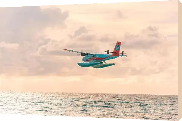 Ari Atoll, Maldives - 05.10.2019: Seaplane at tropical beach resort. Luxury summer travel destination seaplane in Maldives islands. Exotic vacation