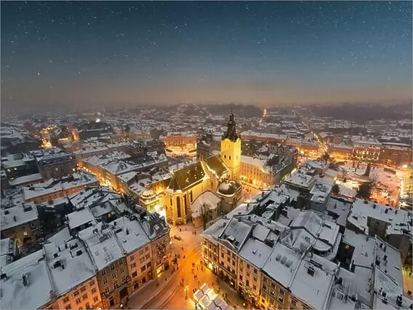 Gorgeus cityscape of winter Lviv city from top of town hall during sunset, Ukraine. Landscape photography