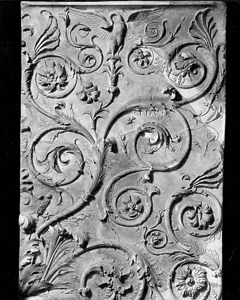 Panel of Ara Pacis Augustae in Rome with decorative plants shooting up and spiraling