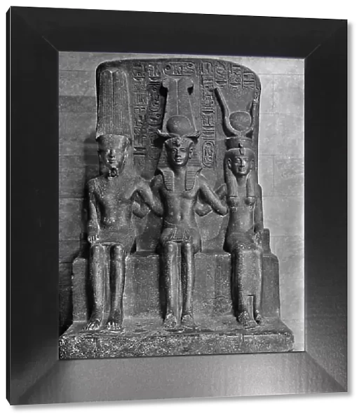 Stele depicting the Egyptian divine triad of the Pharaoh Ramses II between the god Amon-Ra and the goddess Hathor, in the Statuary of the Museo Egizio, Turin
