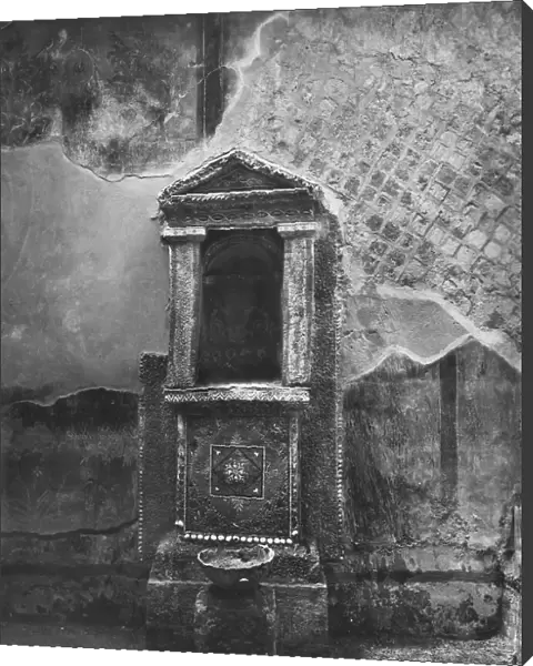 The lararium in the House of the Skeleton, in Herculaneum