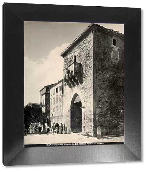A group of men in front of Porta San Francesco, or Porta del Loco, in San Marino